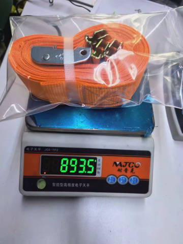 Packaged sample on a scale showing weight